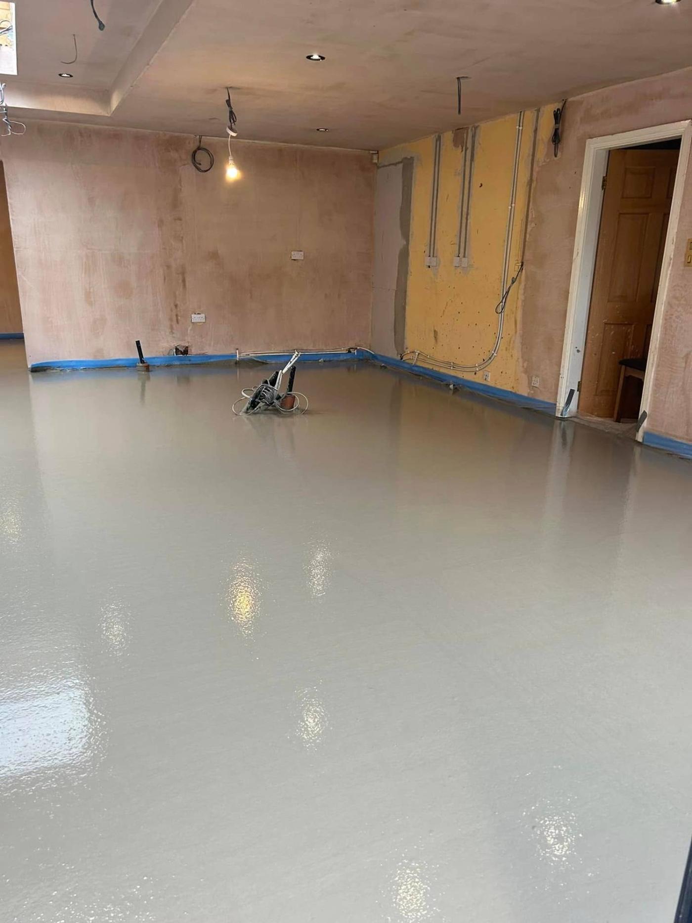 Underfloor heating pipes laid out and ready for a liquid screed pour